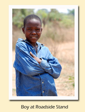 boy at roadside stand