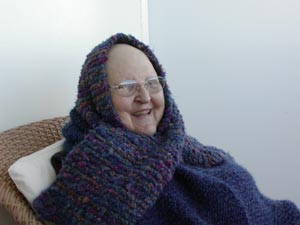 Bev in scarf on balcony of cruise ship